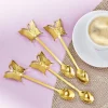 4 cuillères papillons