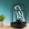 Lampe néon oiseau dans sa cage