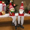 Lot de 2 figurines de Noël assises