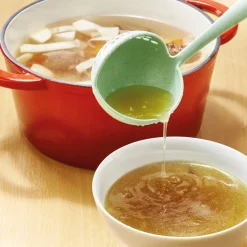 Louche passoire verte