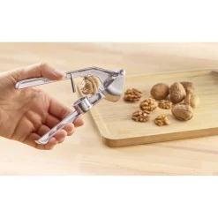 Presse-ail dénoyauteur