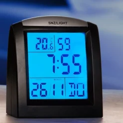 Reveil compact radio piloté